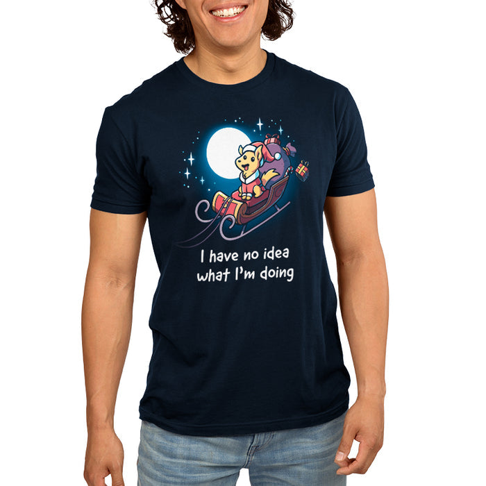 Premium Cotton T-shirt_TeeTurtle navy blue Santa Paws apparel featuring a dog dressed as Santa riding in a sleigh in the moonlit sky with presents flying off, and the caption, "I Have No Idea What I'm Doing".