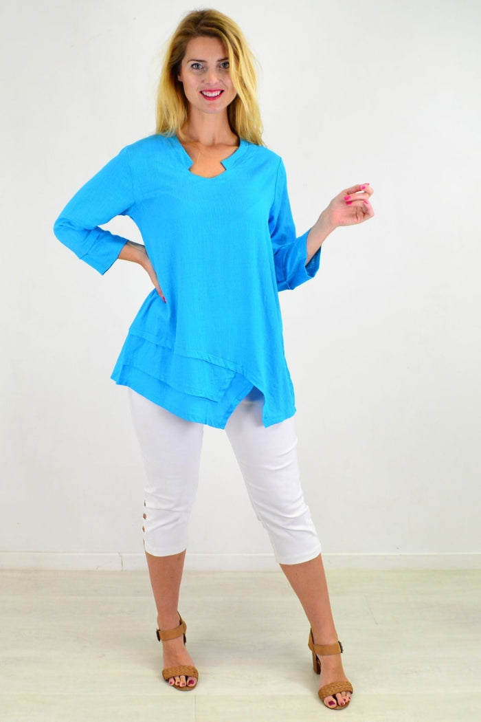 Sky blue linen cotton tunic top by Ruby Rain, featuring a relaxed fit and soft fabric, displayed on a mannequin.