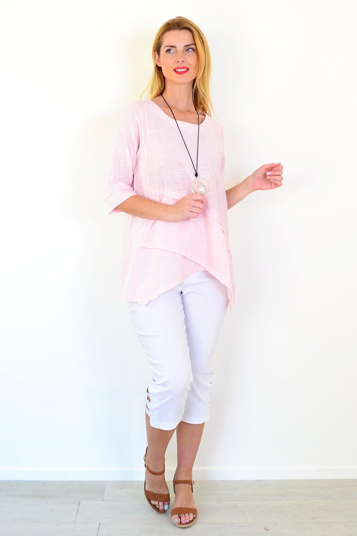 Soft pink linen blend tunic top by Ruby Rain, featuring a relaxed fit and subtle texture, displayed on a neutral background.