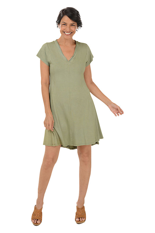 Woman wearing a solid short sleeve olive dress