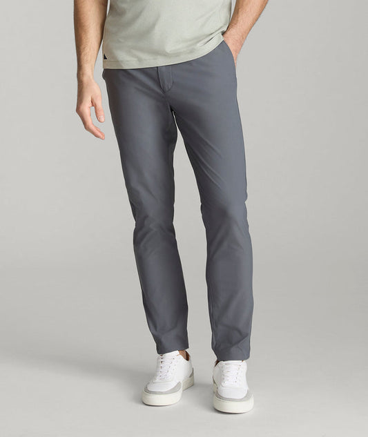 Model is wearing UNTUCKit chancellor pants in iron gate.