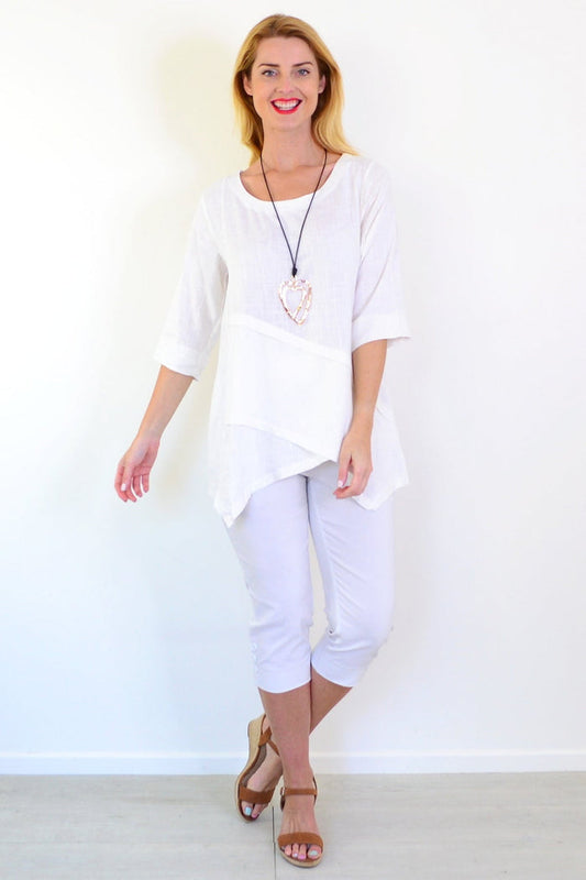 White layered linen blend tunic top by Ruby Rain, showing casual fit with layered design and lightweight fabric.
