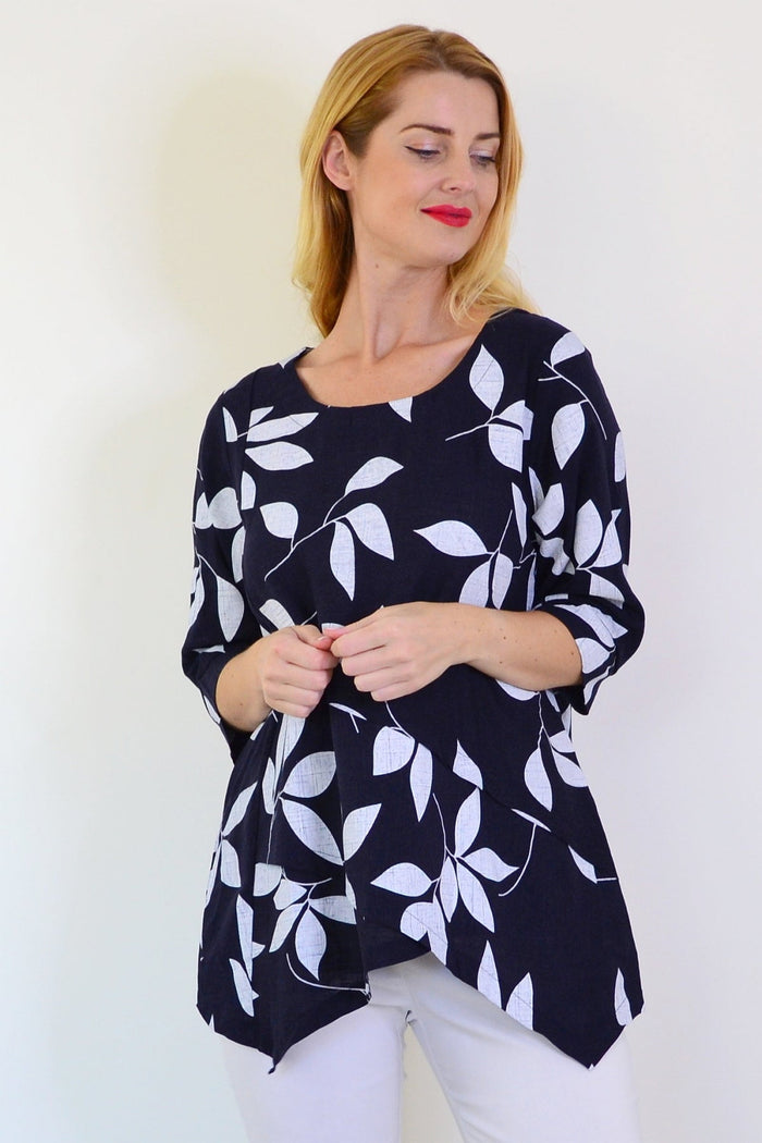 White Petals linen blend tunic top by Ruby Rain featuring a relaxed fit and lightweight fabric, perfect for casual wear.