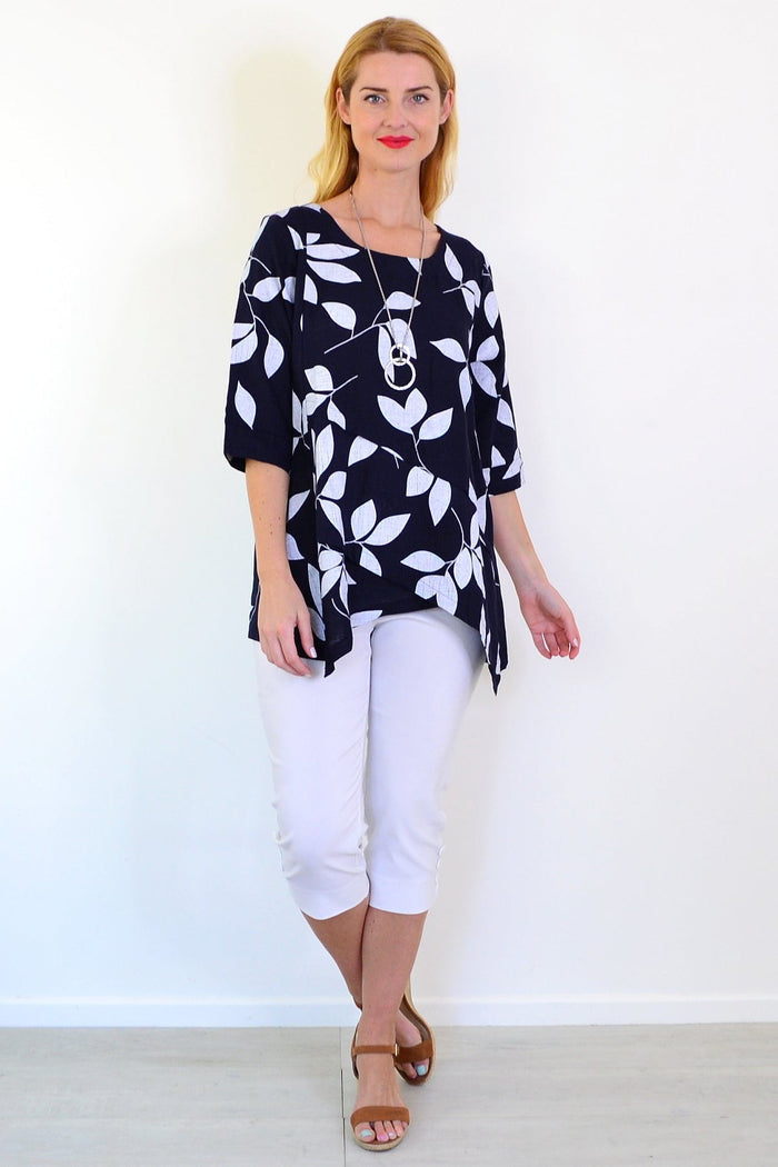 White Petals Linen Blend Tunic Top by Ruby Rain, featuring a relaxed fit with subtle floral design and lightweight fabric.