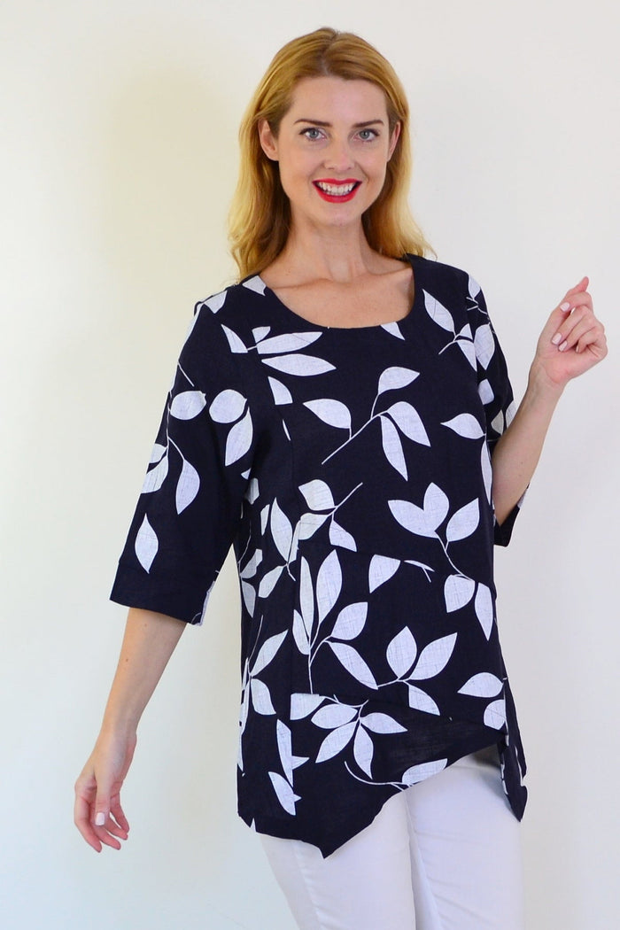 White Petals Linen Blend Tunic Top by Ruby Rain, showing a lightweight, flowy tunic with a relaxed fit and subtle petal pattern.