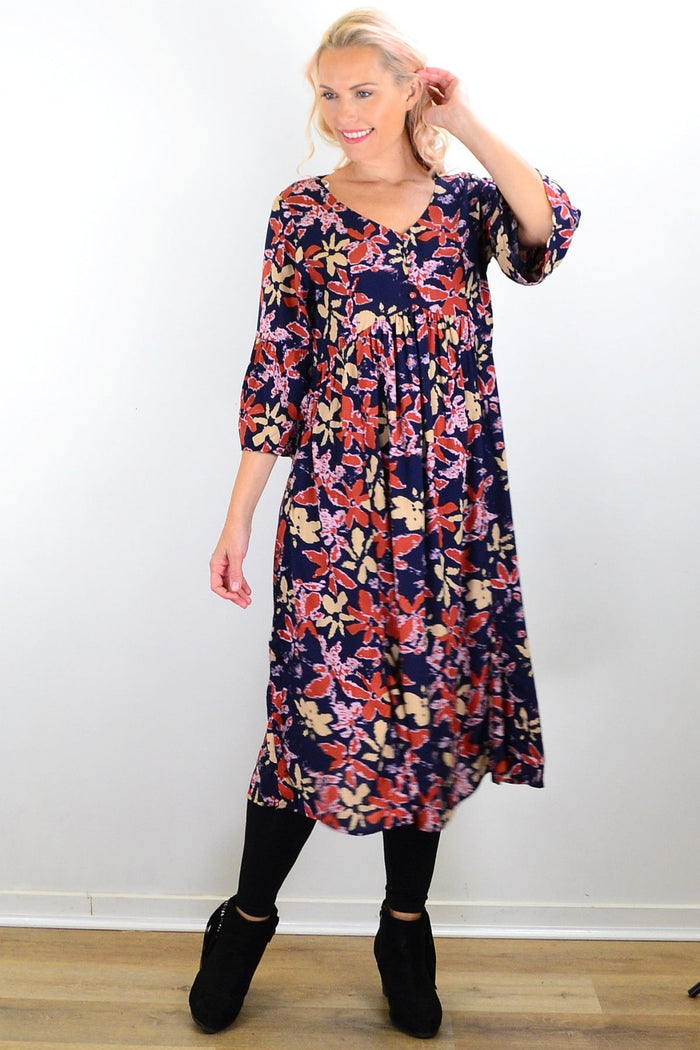 Hourglass Winter Leaves Midi Tunic Dress, showcasing a stylish dress with leaf patterns and a comfortable fit.