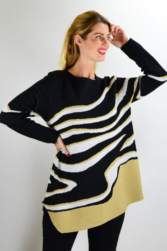 Zebra knit tunic jumper by Cafe Latte featuring black and white animal print, long sleeves, and cozy knit fabric.