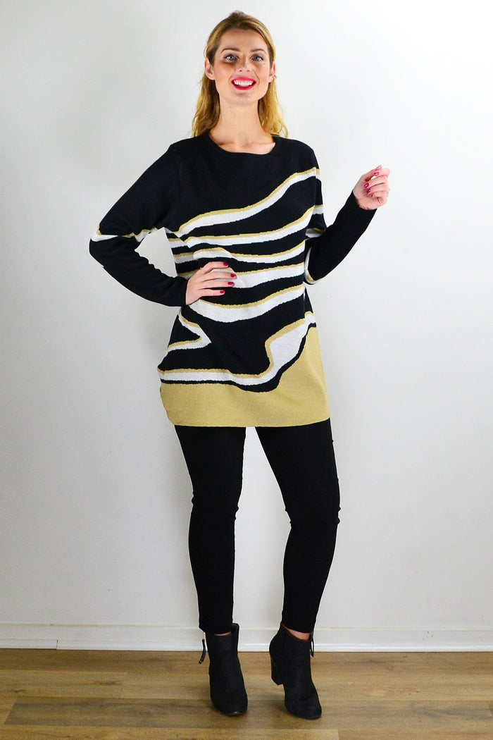 Zebra print knit tunic jumper by Cafe Latte featuring a cozy, stylish design with long sleeves and relaxed fit.